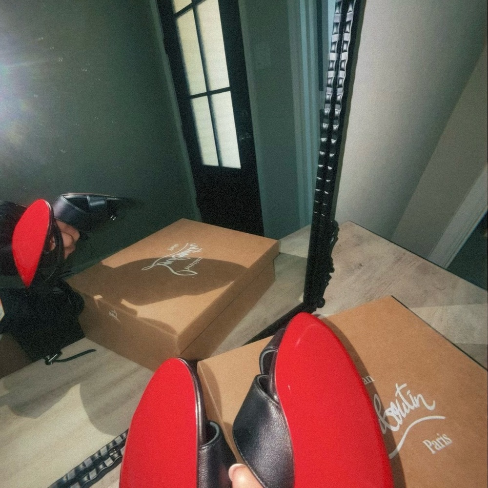 Christian Louboutin Black Leather Pointed-Toe Pumps with Red Soles